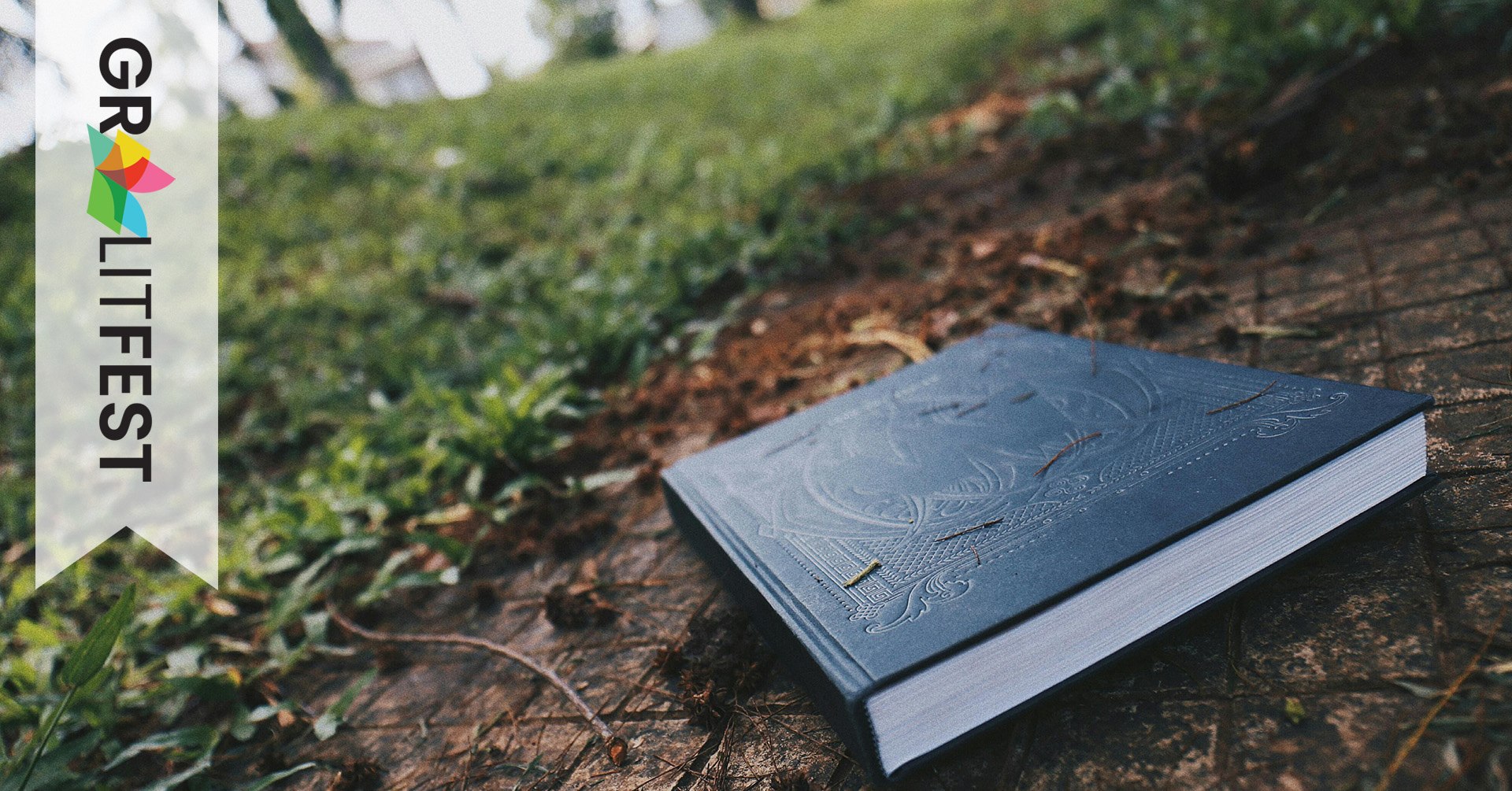 book on path in park