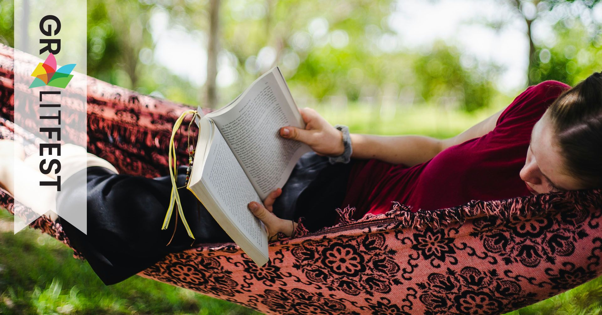 young woman reading in hammock